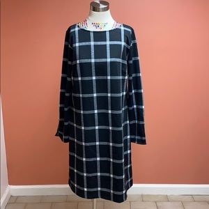 Black and white boxed dress.